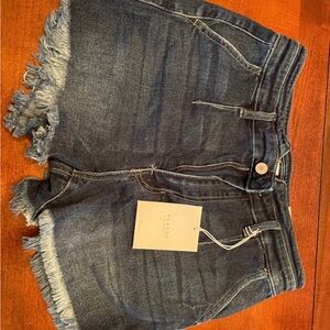 KanCan Los Angeles Tag on Dark Denim